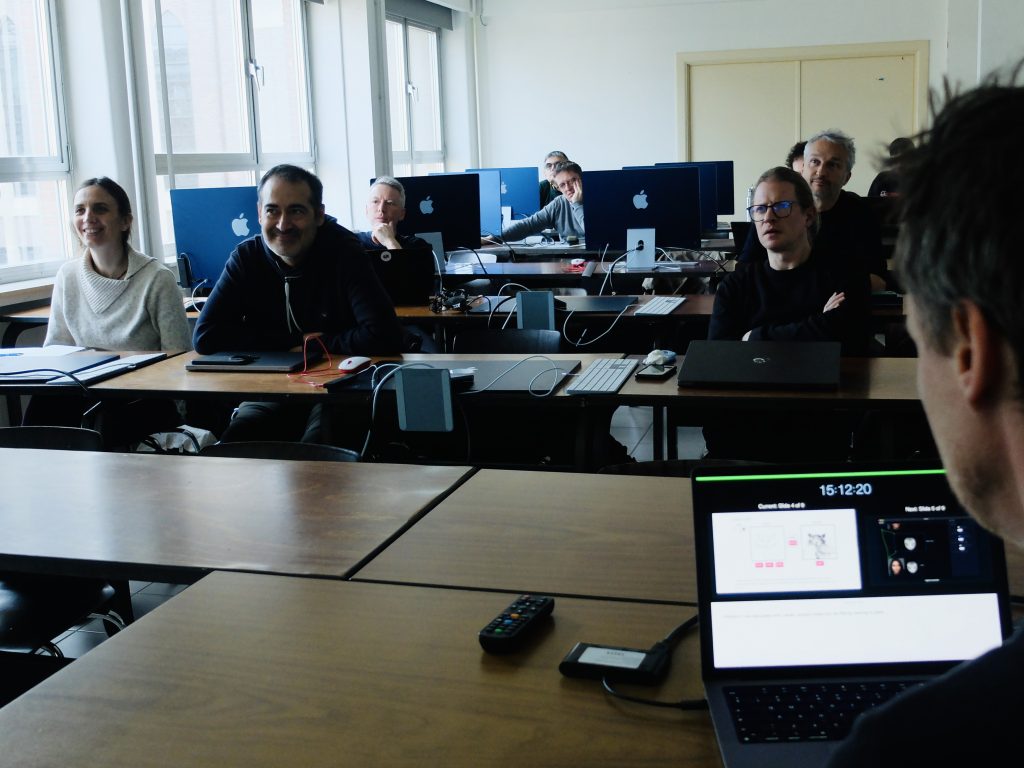 articipants attending a workshop session on machine learning and artistic practice in a classroom at Sint Lucas Antwerpen